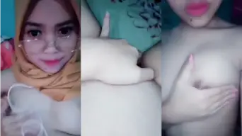 ABG Hijab Bekacamata Montok Bugil Video by PornGo